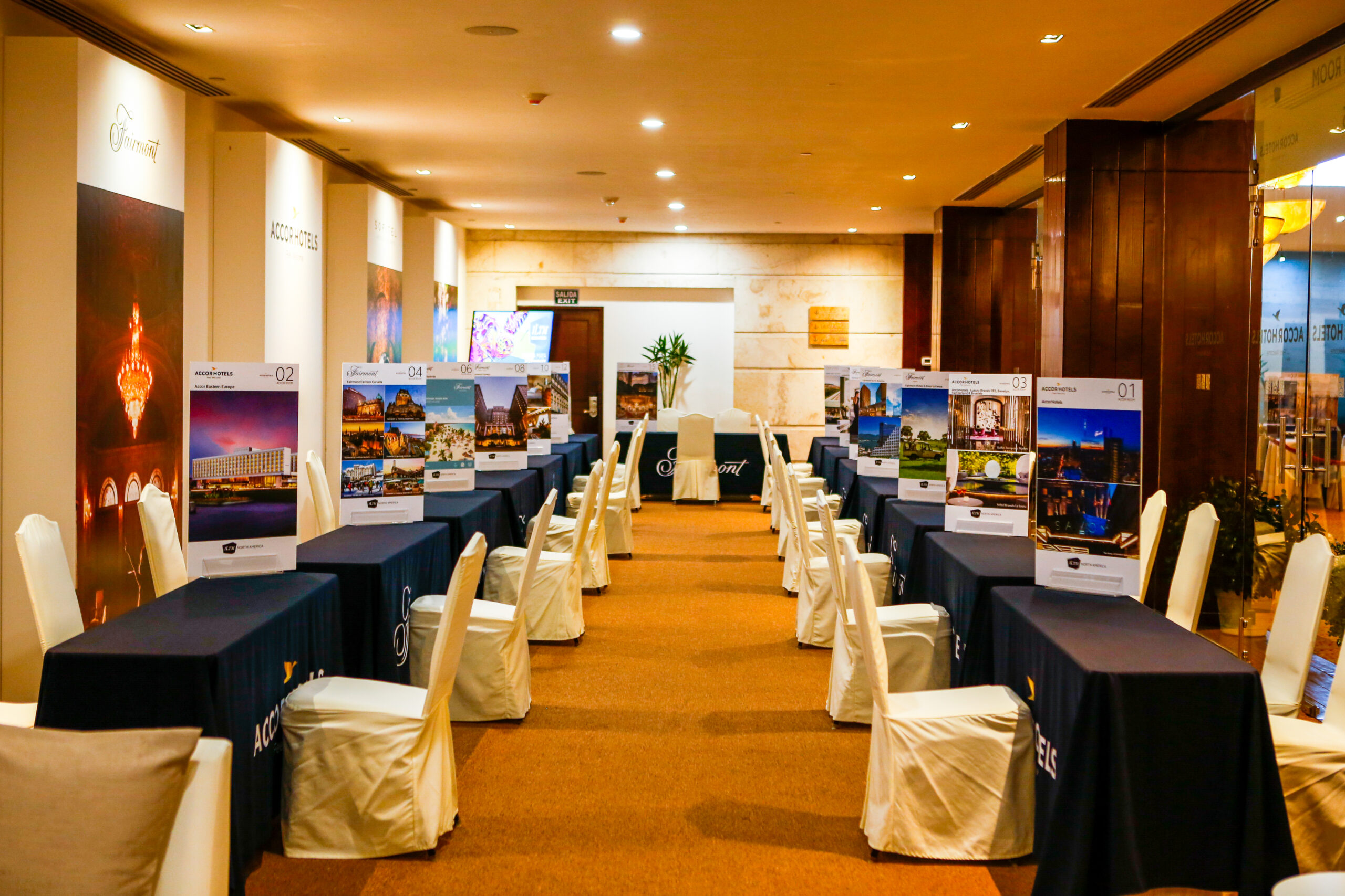 Corporate event stage with branding and lighting